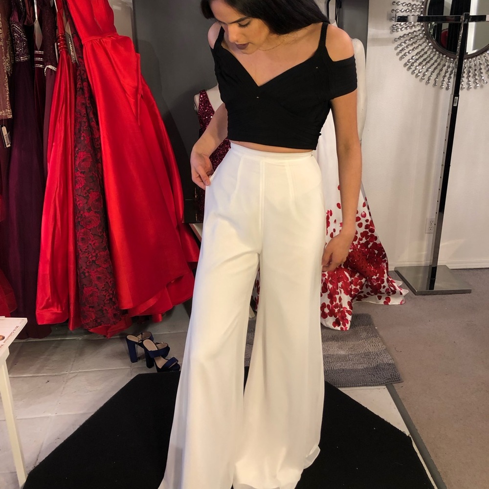 2 piece jumpsuit black top white bottoms